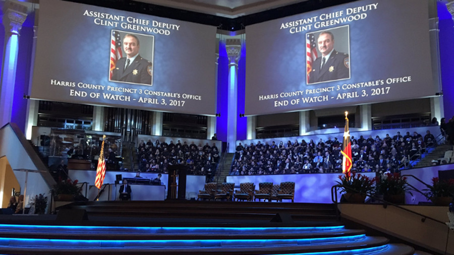 Harris County Precinct 3 Consable's Office Assistant Chief Deputy Clint Greenwood was remembered Thursday as thousands of officers from across the country gathered to pay their respects.