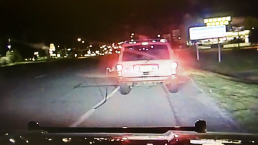 A Clay County deputy arrested a woman early Wednesday morning after she was pulled over with a gas pump still attached to her vehicle's tank.