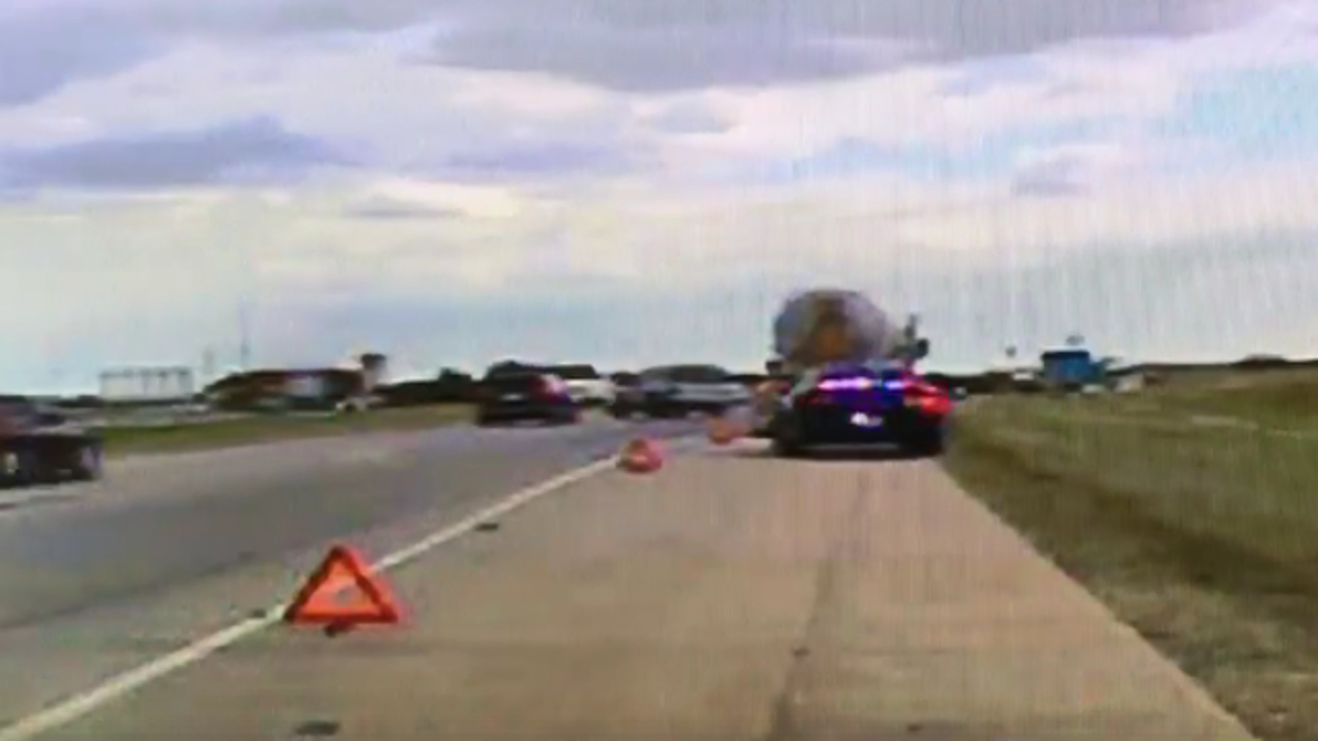 A newly released dashboard camera video shows an Oklahoma Highway Patrol trooper's close call.