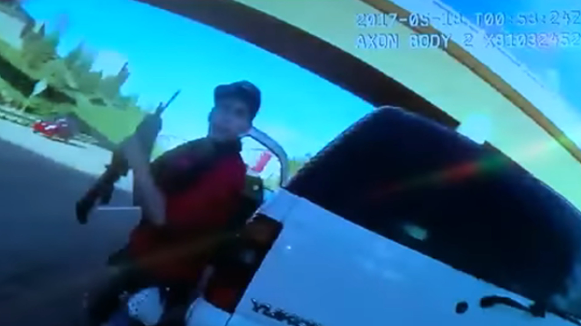 As Douglas County Sheriff's Deputy Brad Proulx came back around the vehicle, the suspect later identified as 25-year old Deyon Marcus Rivas-Maestas exited the SUV and swung a rifle toward his face.