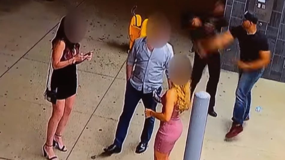Chicago police say they have arrested a man caught on video punching a female security guard at a River North condo building over the weekend.