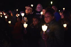 An estimated 30,000 people attended the candlelight vigil held on the National Mall on May 13th. An estimated 30,000 people attended the candlelight vigil held on the National Mall on May 13th.