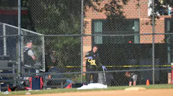Police work at the site of the gunshot at Eugene Simpson Stadium Park in Alexandria, Virginia on June 14, 2017. Steve Scalise, a U.S. House Republican leader, was among possibly five people shot by a gunman Wednesday morning as he was playing baseball game with other congressmen and aides.