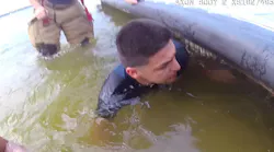 Officer's Body Camera Footage Shows Rescue of Young Boy Trapped Under Dock