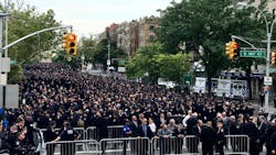 Thousands of police officers gathered Tuesday to pay tribute to NYPD Officer Miosotis Familia, who was killed as she sat in a mobile command center in the Bronx last week. Thousands of police officers gathered Tuesday to pay tribute to NYPD Officer Miosotis Familia, who was killed as she sat in a mobile command center in the Bronx last week.
