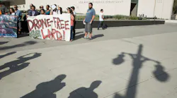 Protestors show their opposition to the LAPD getting drones on Aug. 8, 2017 in Los Angeles. They felt the money could be re-invested in the community.