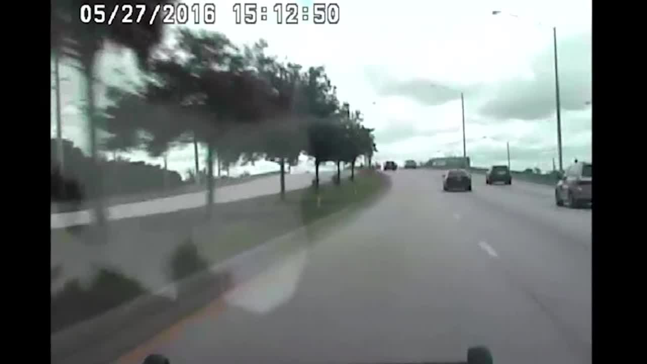 Video: PBSO deputy, while speeding, crashes cruiser into car