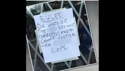 A sign posted in front of a gym in Atlanta has outraged police officers and community members alike. A sign posted in front of a gym in Atlanta has outraged police officers and community members alike.