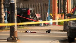 Evidence markers surround bloody clothes near the scene of a shooting at the intersection of West 24th Street and South Western Avenue, Sunday, September 17, 2017, on the Lower West Side of Chicago. Evidence markers surround bloody clothes near the scene of a shooting at the intersection of West 24th Street and South Western Avenue, Sunday, September 17, 2017, on the Lower West Side of Chicago.