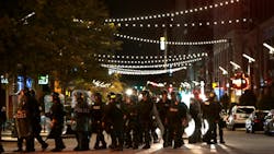 Police officers move on Washington Avenue at Tucker Boulevard as police clear the entertainment district on Sunday, Sept. 17, 2017. Police officers move on Washington Avenue at Tucker Boulevard as police clear the entertainment district on Sunday, Sept. 17, 2017.