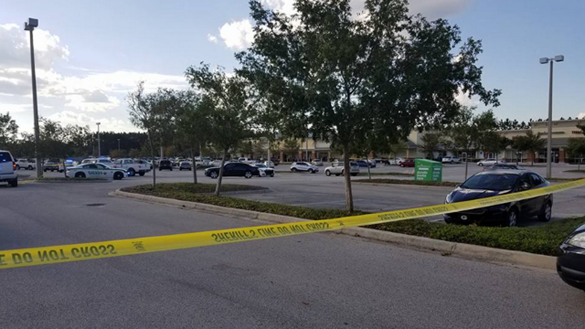 An unprovoked 18-year-old wanted on a narcotics warrant opened fire on a uniformed U.S. Customs and Border Protection agent as he was walking out of an Oakleaf Publix before killing himself Tuesday afternoon