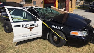 Two officers were injured Sunday afternoon in a traffic crash as they responded to a road rage call, police said.