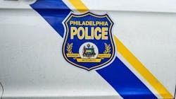 A Philadelphia police officer responding to a call for assistance Saturday night noticed a red dot of light on his shirt, leading him to believe that he was being targeted by a firearm fitted with a laser.