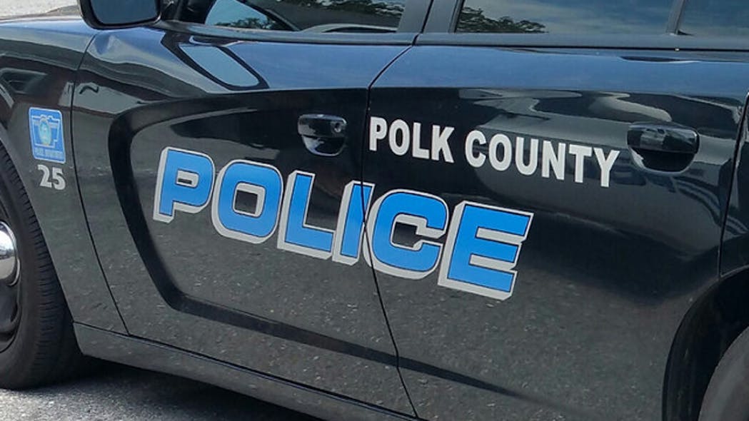 A Polk County police detective was fatally shot and two suspects were taken into custody Friday.