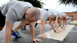 Members of the Virginia State Police's 126th Basic Session take part in physical training exercises.