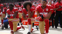 From left, San Francisco 49ers' Eli Harold (58), quarterback Colin Kaepernick (7) and Eric Reid (35) kneel during the national anthem before their NFL game against the Dallas Cowboys on Sunday, Oct. 2, 2016 in Santa Clara, Calif.