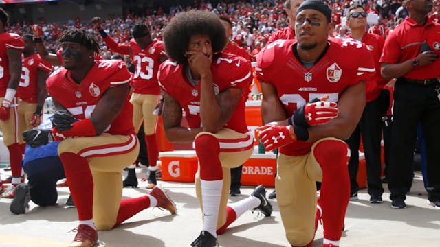From left, San Francisco 49ers&apos; Eli Harold (58), quarterback Colin Kaepernick (7) and Eric Reid (35) kneel during the national anthem before their NFL game against the Dallas Cowboys on Sunday, Oct. 2, 2016 in Santa Clara, Calif.