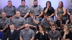 Members of the Polk County Police Department become emotional sitting in the choir loft during the funeral of fellow Polk County police detective Kristen Hearne on Tuesday, Oct. 3, 2017, Members of the Polk County Police Department become emotional sitting in the choir loft during the funeral of fellow Polk County police detective Kristen Hearne on Tuesday, Oct. 3, 2017,