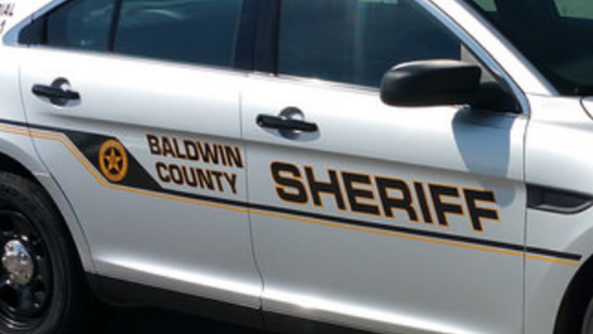 Authorities revealed more information Tuesday about the shooting of a young man who was wounded when a Baldwin County sheriff's deputy shot the man in the arm while taking him into custody Monday.