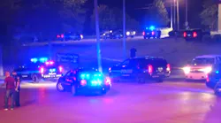A Homewood police officer was wounded and a suspect was killed during a shootout in the parking lot of a business on Thursday.