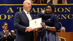 NYPD Officer Dalsh Veve's wife Ester and 2-year-old daughter Dashi accept his promotion to detective.