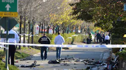 Police walk past mangled bikes after a gunman emerged from a crashed Home Depot rental truck and opened fire after apparently plowing down bike riders on a Lower Manhattan bike path on Tuesday, Oct. 31, 2017. The New York Police Department reported one man was in custody after initial reports of gunfire set off a mad scramble in the downtown area.