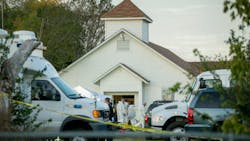 Investigators work at the scene of a mass shooting at the First Baptist Church in Sutherland Springs, Texas on Sunday, Nov. 5, 2017.