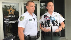 Hillsborough County Sheriff&apos;s Deputies Trent Migues, left, and Benjamin Thompson helped rescue 82-year-old Leona Evans after she crashed her SUV into a pond Saturday evening.