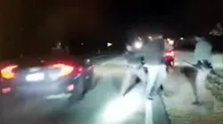The quick reaction of a Boone County Sheriff's Deputy Chuck Schutz prevented he and other deputies from being struck by an oncoming car.