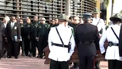 Nearly 200 police officers, firefighters, paramedics, family and friends honored Deputy Michael Ryan at his funeral at the Lauderhill Performing Arts Center.