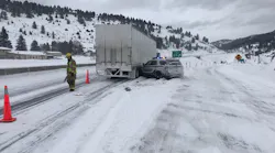 Gallatin County Sheriff's Deputy Randy Schott is lucky to be alive after his patrol car was struck by a tractor trailer Saturday morning.