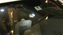 The Dallas Police Department launched a search Thursday for a suspect who opened fire on one of its patrol cars as an officer was driving.
