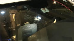 The Dallas Police Department launched a search Thursday for a suspect who opened fire on one of its patrol cars as an officer was driving. The Dallas Police Department launched a search Thursday for a suspect who opened fire on one of its patrol cars as an officer was driving.