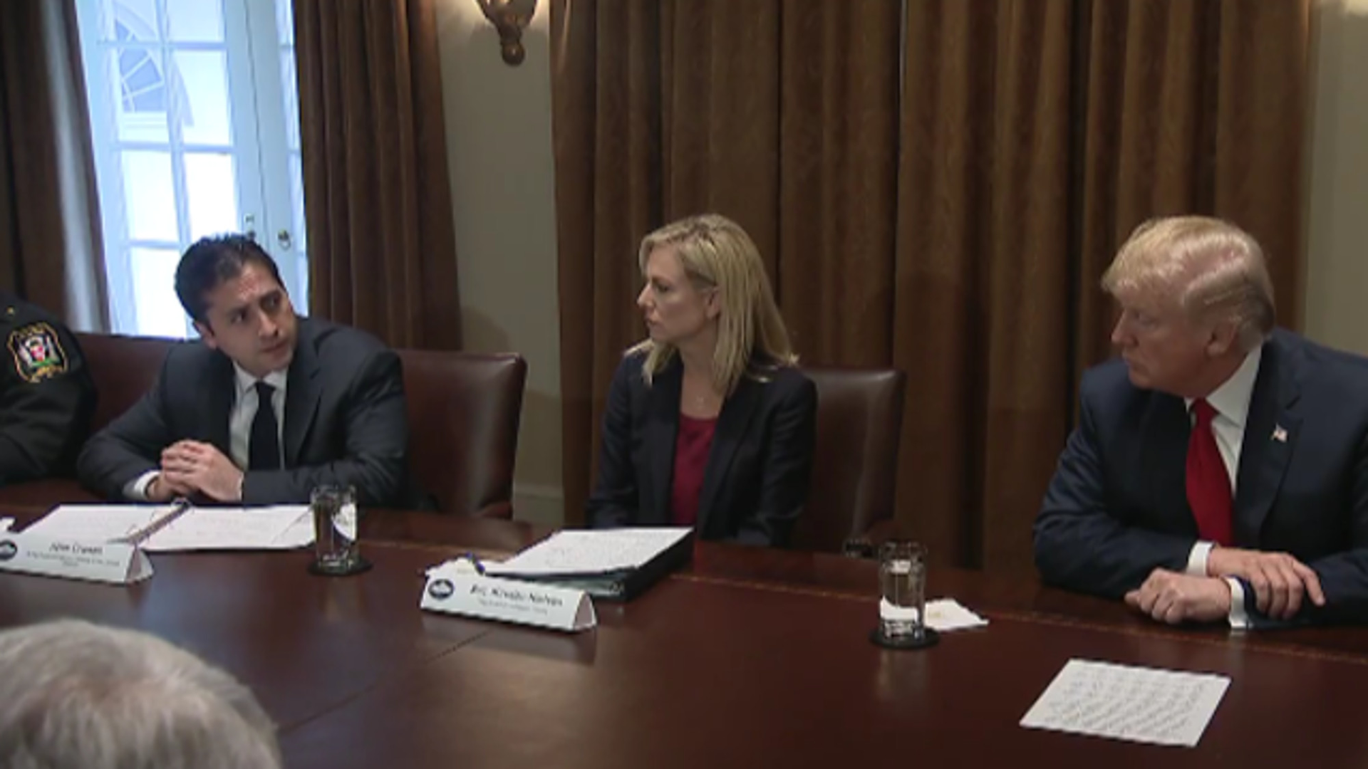 John Cronan, acting assistant attorney general of the Justice Department&rsquo;s criminal division, (seen on the left0 briefed Trump on the gang activity, telling him that MS-13 is 'one of the most significant threats to the public safety of our communities.'