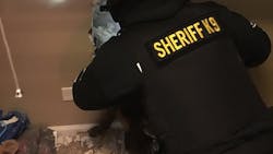 Deputies smash through a wall to apprehend Matthew T. Heidbrick on a warrant at his home on March 8. Deputies smash through a wall to apprehend Matthew T. Heidbrick on a warrant at his home on March 8.