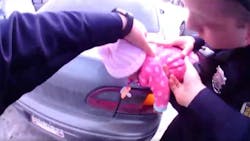 Newly released body camera video shows Shaker Heights Police Officers Alex Oklander and Ryan Sidders save a choking baby. Newly released body camera video shows Shaker Heights Police Officers Alex Oklander and Ryan Sidders save a choking baby.