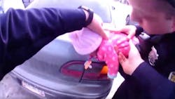 Newly released body camera video shows Shaker Heights Police Officers Alex Oklander and Ryan Sidders save a choking baby.