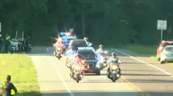 Thousands who showed up to pay their final respects to Gilchrist County Sheriff’s Sgt. Noel Ramirez and Deputy Taylor Lindsey during memorial service at Bell High School Tuesday morning.