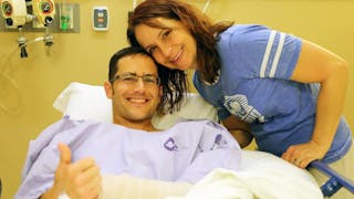Minnesota State Patrol Sgt. Mike Krukowski is seen with his wife, Chrissy, at Hennepin County Medical Center in Minneapolis.