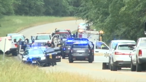 Raleigh Police Officer E.P. Morris' patrol car left the roadway and struck a tree before becoming engulfed in flames around noon Thursday on Highway 18.