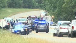 Raleigh Police Officer E.P. Morris' patrol car left the roadway and struck a tree before becoming engulfed in flames around noon Thursday on Highway 18. Raleigh Police Officer E.P. Morris' patrol car left the roadway and struck a tree before becoming engulfed in flames around noon Thursday on Highway 18.