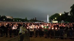 An estimated 30,000 people attended The National Law Enforcement Officers Memorial Fund's 30th annual candlelight vigil Sunday night on the National Mall in Washington, D.C. An estimated 30,000 people attended The National Law Enforcement Officers Memorial Fund's 30th annual candlelight vigil Sunday night on the National Mall in Washington, D.C.