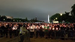 An estimated 30,000 people attended The National Law Enforcement Officers Memorial Fund&apos;s 30th annual candlelight vigil Sunday night on the National Mall in Washington, D.C.