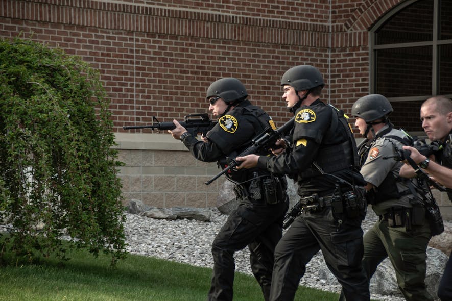 Leelanau County Sheriff&rsquo;s Office, Mich., responding during a mock active shooter scenario wearing plate carriers by Armor Express. Image courtesy of Armor Express