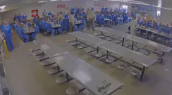 Los Angeles County Sheriff's Deputy Carlos Escamilla was alerted to the emergency when he heard one inmate call out, 'We have a man down!'