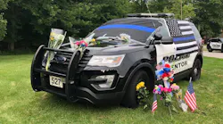 Mentor police have a person in custody in connection with an early morning Sunday hit-and-run crash that killed one of its officers.
