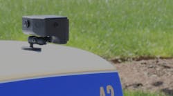 The Move Over Camera mounted on the trunk of a police vehicle.
