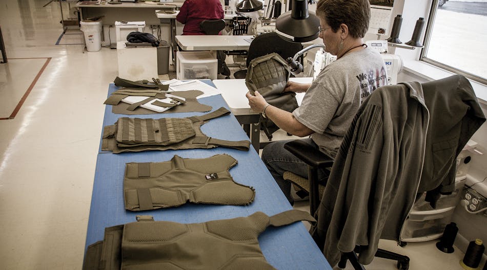 A R&amp;D Sample Maker at Armor Express in the final phases of building a Lighthawk Tactical SAU plate carrier.