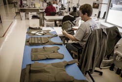 A R&D Sample Maker at Armor Express in the final phases of building a Lighthawk Tactical SAU plate carrier. A R&D Sample Maker at Armor Express in the final phases of building a Lighthawk Tactical SAU plate carrier.