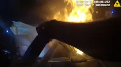 Newly released body camera video shows two Atlanta police officers rescue a passenger from a burning car.